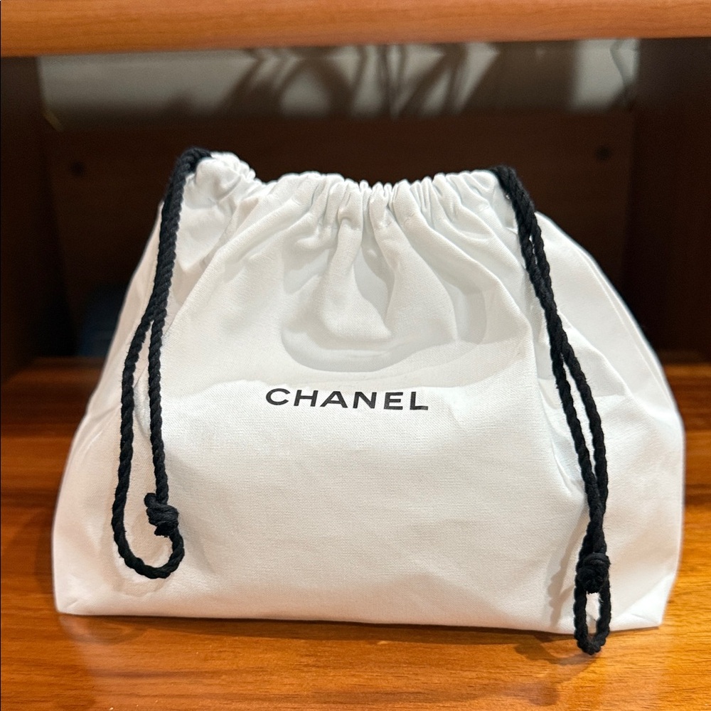 CHANEL White Pouch with Black Drawstring